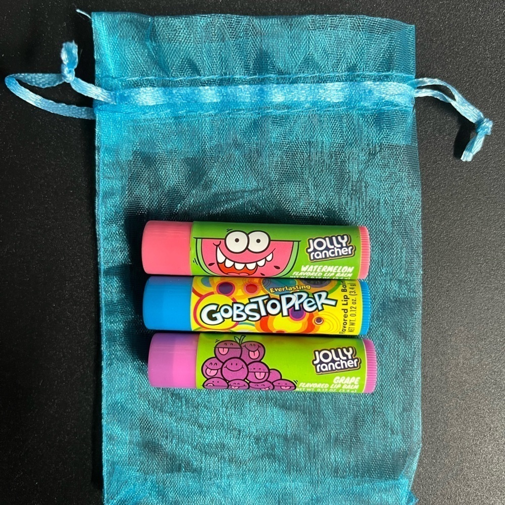 Set of 3 brand new candy lip balm chapsticks